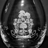 engraved cristoff wine decanter with family crest - closeup