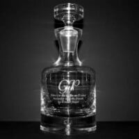 engraved taylor whiskey decanter with groomsmen initials and quote