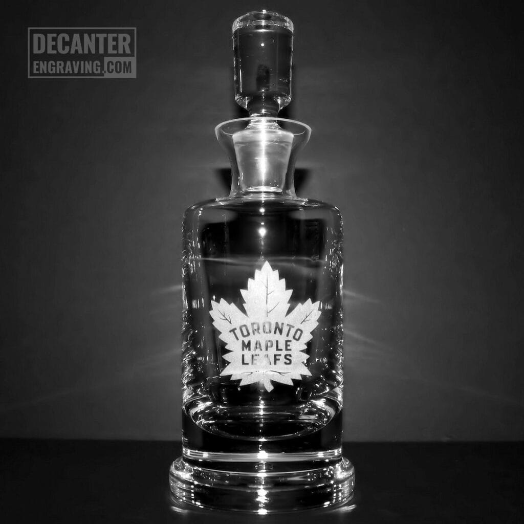 engraved whiskey decanter with toronto maple leafs logo