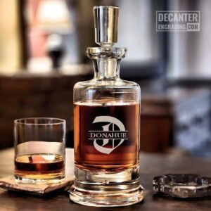 Personalized Kensington lead-free crystal whiskey decanter with custom engraved Dalton split-initial design, shown with matching whiskey glass.