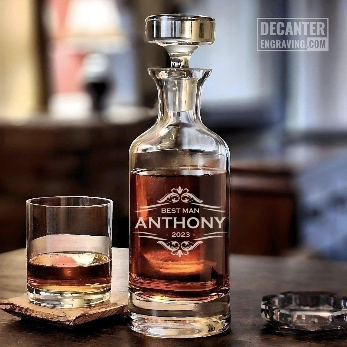 Personalized Wellington lead-free crystal whiskey decanter with custom engraved Astor ornate scrollwork & title design, shown with matching whiskey glass.