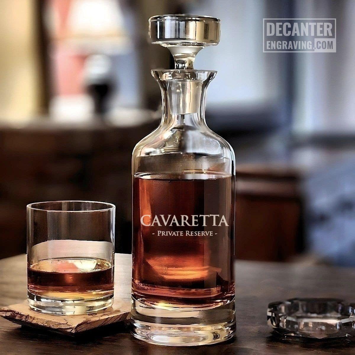 Wellington Whiskey Decanter | Essence 22 Personalized Wellington lead-free crystal whiskey decanter with custom engraved Essence reserve wordmark design, shown with matching whiskey glass.