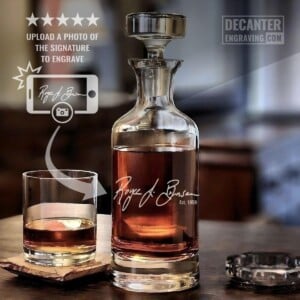 Personalized Wellington lead-free crystal whiskey decanter featuring handwritten signature engraving, shown with matching whiskey glass.
